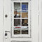 Белая входная дверь с решеткой и фрамугой РД-2638